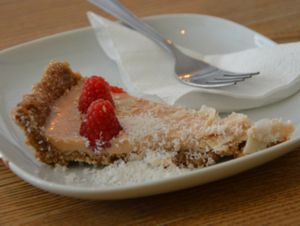 Coconut cheesecake with raspberries at Pastva in Prague