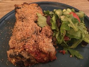 Vegan lasagna and salad at Pastva in Prague