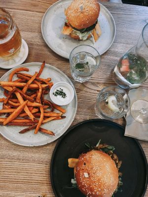 Jamaican jackfruit burger and green burger with sweet potato fries and chives mayo at Pastva in Prague