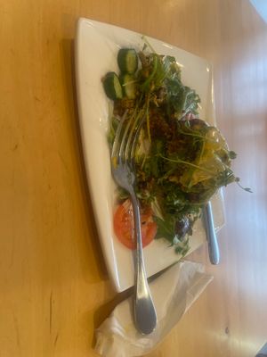 Vegan burger, is in a slide if bread.  at bee-ORGANIC in Huntington