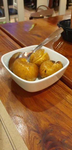 Here's what a portion of their smashed potatoes looks like... at Com Pinta in Ericeira