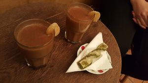 Vegan chai tea and vegetarian sweet at Caj Chai Teahouse in Barcelona