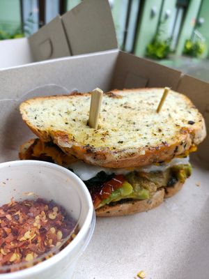 Super Toastie w/ GF bread (melted vegan mozzarella, roasted pumpkin, sauteed spinach, avocado, tomato & basil pesto) at Pels Supershop in Tibubeneng