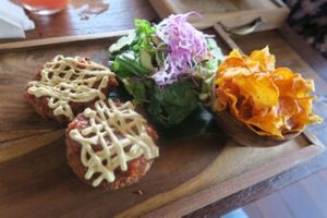 Veggie Schnitzel with Tomato and Cashewsauce, Sweetpotatoechips at Pels Supershop in Tibubeneng