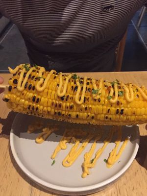 Grilled corn with vegan cheese sauce (~25k) at Pels Supershop in Tibubeneng