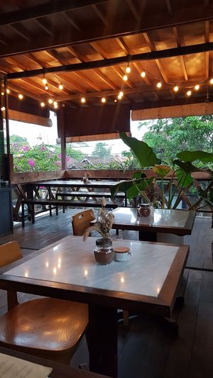 Upstairs seating at Pels Supershop in Tibubeneng