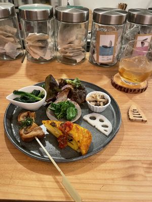 Homemade umeshu (800 yen, at least one drink order is required) and the required appetizer plate (2200 yen)  at Kiboko in Tokyo