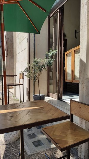 Outdoor seating at Ecru in Rome