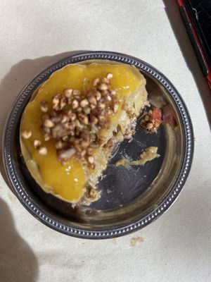 mango cheeaecake half gone!  at Ecru in Rome