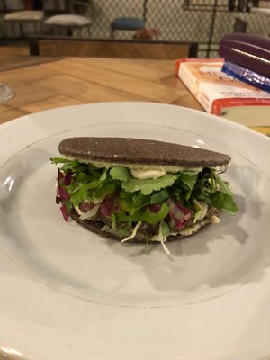 Vegan Burger, home made raw mustard, fermented cabbage cream, salad at Ecru in Rome