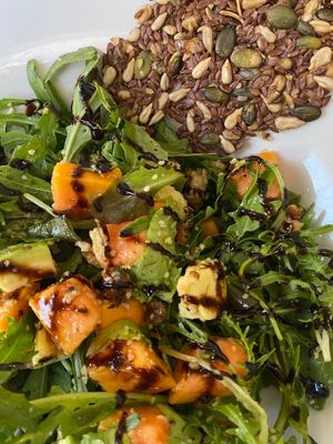 papaya + avo salad with raw crackers  at Ecru in Rome