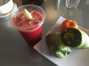 Veggie burrito lunch with juice at Nokturne in Houston