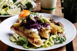 Potato Flautas with sauteed mushrooms, avocado & micro-greens. at Nokturne in Houston