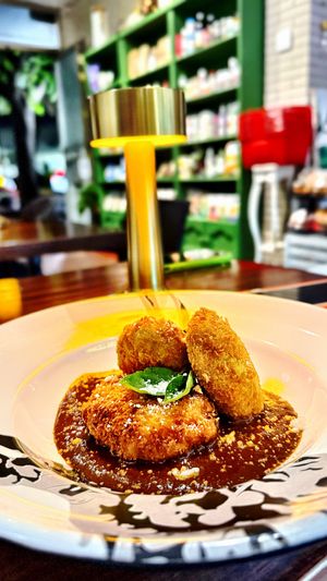Croquetas de papa con mole almendrado   at Vegan Ville in Mexico City