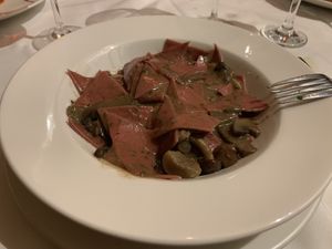 fresh vegan pasta irregularly cut infused with beetroot juice bathed in mushroom sauce at Est! Est! Est! in Belo Horizonte