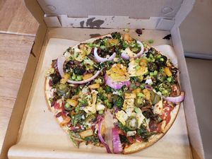 vegan gf pizza loaded with veggies at Pizza Studio in Tukwila