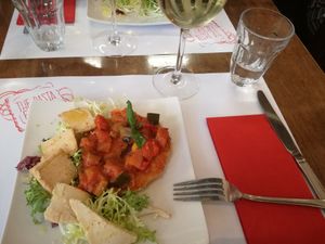 Fresella with tomatoes and vegan cheese slices at Pasta Factory in Manchester