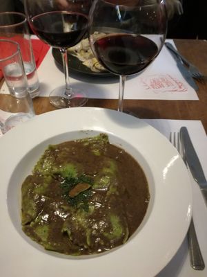Vegan mushroom ravioli with truffle sauce and vegan red wine at Pasta Factory in Manchester