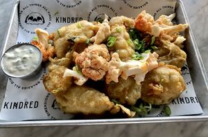 Fried & Pickled: beer battered dill slices with Buffalo-style cauliflower  at Kindred in San Diego