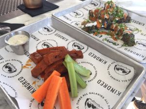 Buffalo seitan and seitan skewers - SO GOOD at Kindred in San Diego