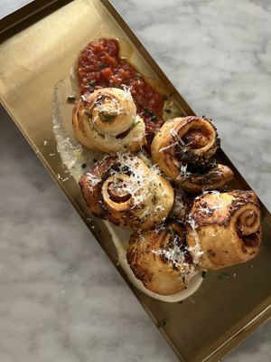 pizza rolls  at Kindred in San Diego