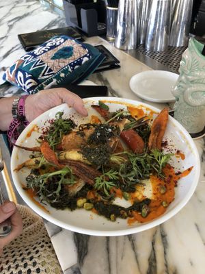 something with carrots and rice thing on bottom with pan fried tempeh I believe! at Kindred in San Diego