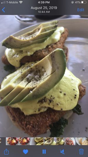 Tofu Benedict w grilled tomato on side  at Kindred in San Diego