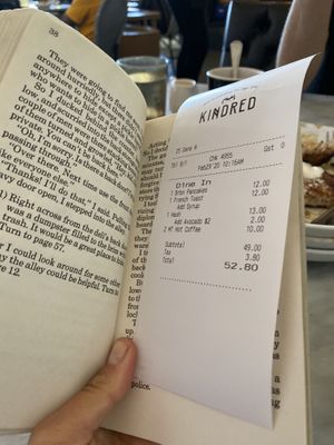 Love how they present your bill! - in a book 📖  at Kindred in San Diego
