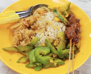 Rice with curry vegetables, bitter gourd, achar and satay at Kwan Inn Vegetarian 观音斋 - Bugis in Central Singapore