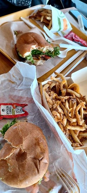 Feasting so hard at Plant Power Fast Food - Ocean Beach in San Diego