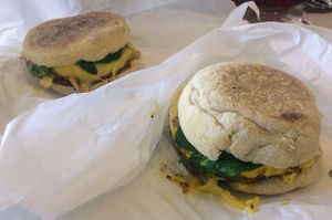 Breakfast sandwiches with vegan meats and non-dairy cheeses on English muffins at Plant Power Fast Food - Ocean Beach in San Diego