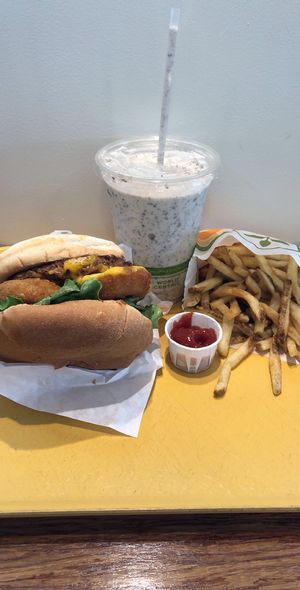 Rambler burger, fries, and cookies & cream shake. at Plant Power Fast Food - Ocean Beach in San Diego