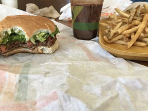The Holy Guacamole Burger with a chocolate shake and fries at Plant Power Fast Food - Ocean Beach in San Diego