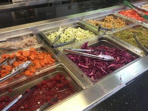 Salad bar toppings at ChickPeas Kitchen in Davis