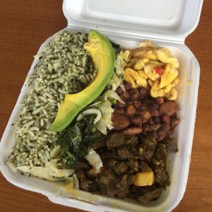 Our first time trying callaloo rice! It was awesome!  at King David Ital Rastaurant in Kingston