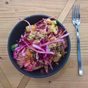 *Small* bowl at Sprout containing millet, broccoli, apricot, orange tempeh, peanut sauce and red cabbage. at Sprout in Dresden