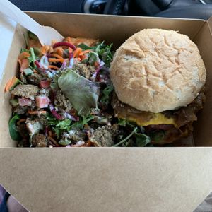 Boss Bear Burger with side Falafel Salad at Nourish Bistro in Banff