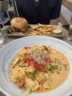 Burger and fries were really good. Mac and cheese was good but very strong flavor after a while it’s too much  at Nourish Bistro in Banff