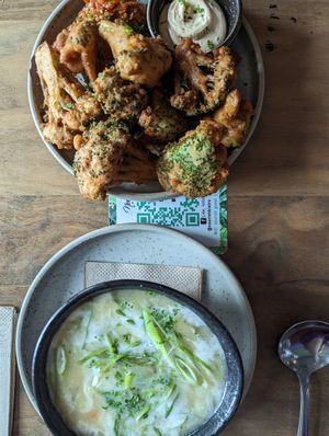 Corn chowder soup and broccoli tempura at Nourish Bistro in Banff