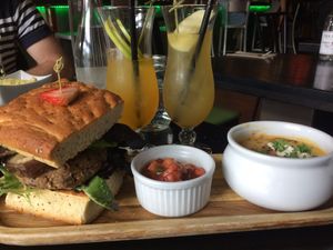 360 burger with cheezy, gravy chips  at Nourish Bistro in Banff