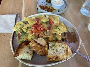 Veganized the mushroom ravioli. Super yummy!  at Nourish Bistro in Banff