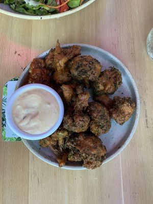 Tempura broccoli. Breading was SO GOOD!   at Nourish Bistro in Banff