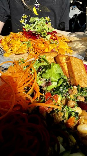 Nourishment Bowl with added Tofu and insanely good vegan nachos. 💯 recommend   at Nourish Bistro in Banff