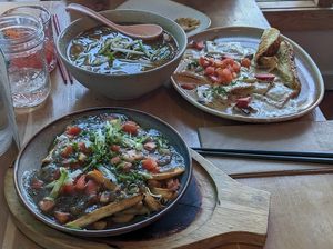 Veggie poutine (didnt try) mushroom ravioli, and ramen. The ramen was my fav - a souper and hearty broth. The ravioli was sweet/savory which I can imagine might be a miss for some. at Nourish Bistro in Banff