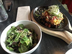 Lasagna and salad at Nourish Bistro in Banff