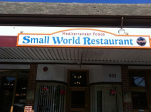 Small World exterior sign at Small World in Napa