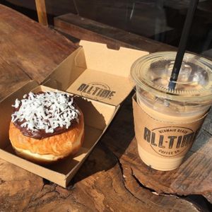 Vegan Lamington donut and iced soy maple latte  at All-Time Coffee Co in Mermaid Beach
