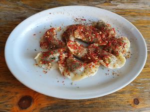 pierogi with spinach and spicy topping at Bar Górski in Zakopane