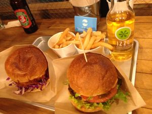 chiken burger to the left and cheese burger to the right at Ain Soph.Ripple Kabukicho in Tokyo