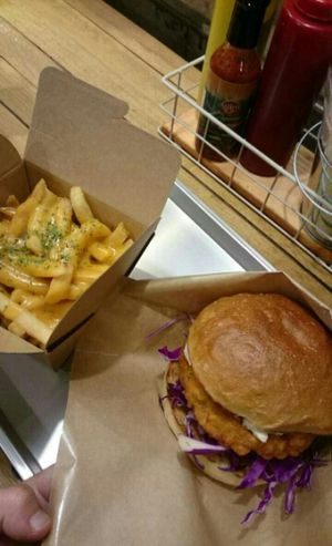 cheesy fries and chicken burger  at Ain Soph.Ripple Kabukicho in Tokyo